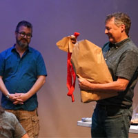 Steven Levine presents retirement gift to Andrew Gibbon
